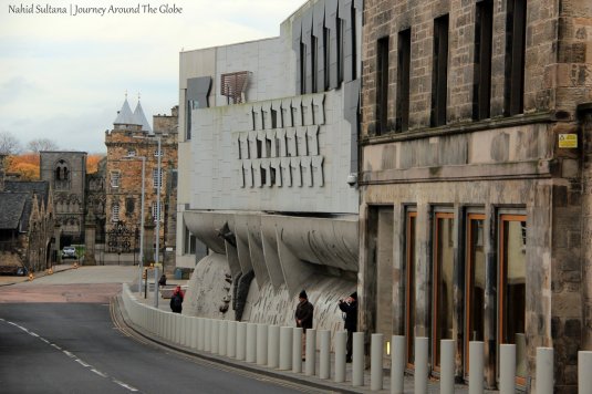 Royal Mile - the backbone of Old Edinburgh. Scottish Parliament (on the right) and Holyrood Palace (in the back)