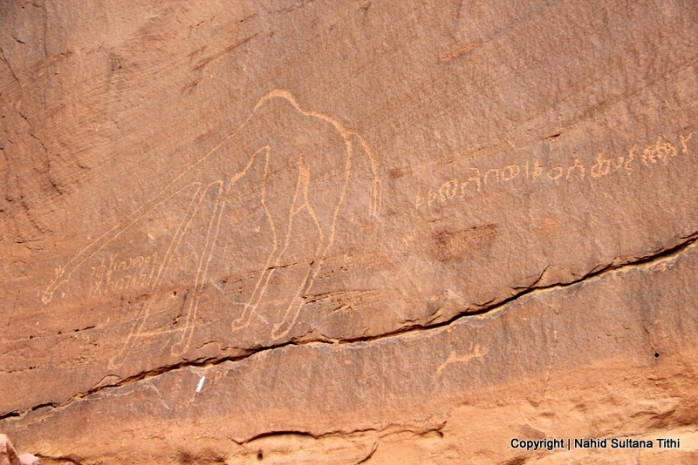 Etched inscription on mountain walls in Wadi Rum, Jordan
