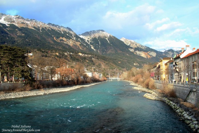 River Inn running thru Innsbruck with the Alps surrounding the town